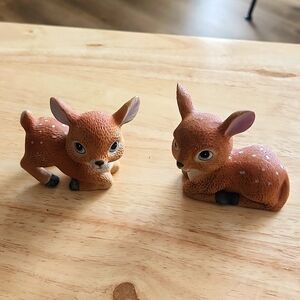 Porcelain figurines by Homco. Size is 2 1/2"W X 3"H. Two  brown deer figurines.